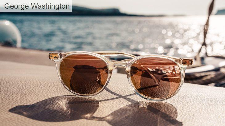 white framed brown lens sunglasses