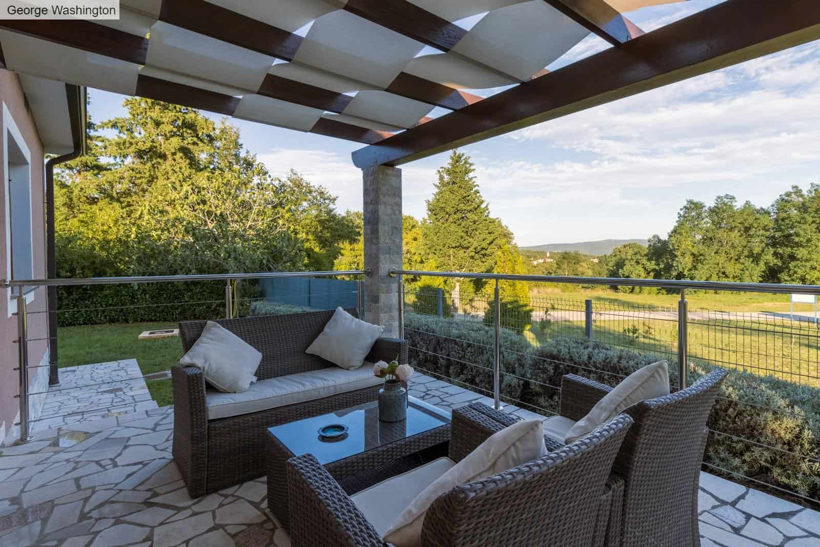 brown wicker chairs and table