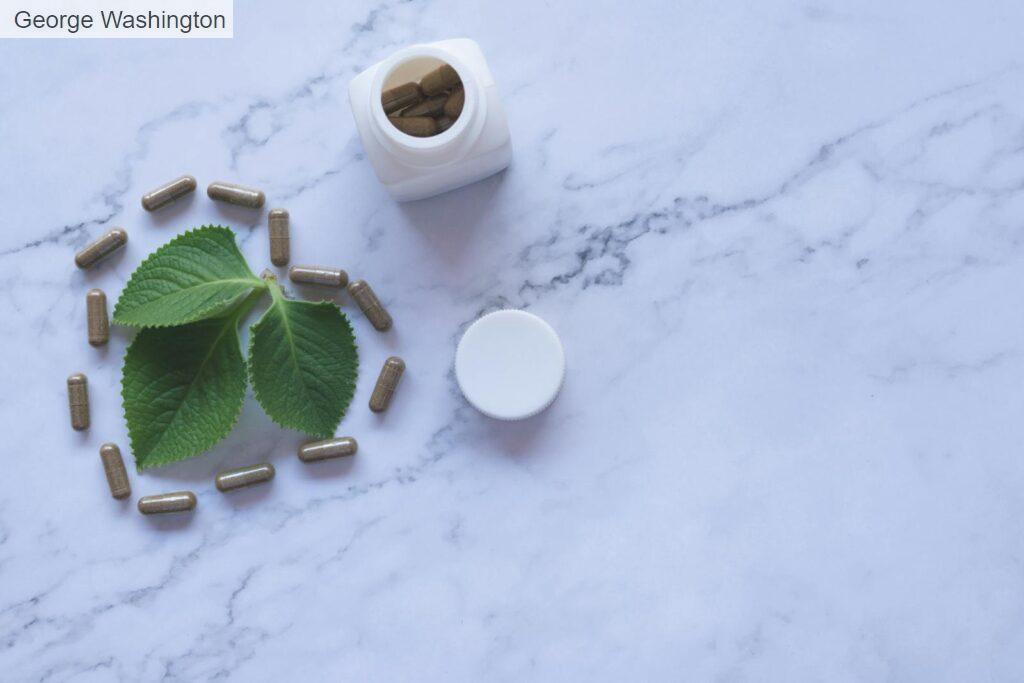 A Bottle of Capsules on a Marble Surface